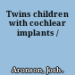 Twins children with cochlear implants /