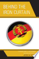 Behind the iron curtain : a teacher's guide to East Germany and cold war activities /