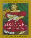 Little girl in a red dress with cat and dog /